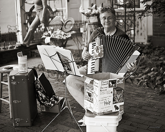 "People, Street Scenes, Pondered Artifacts"
