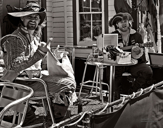 "People, Street Scenes, Pondered Artifacts"