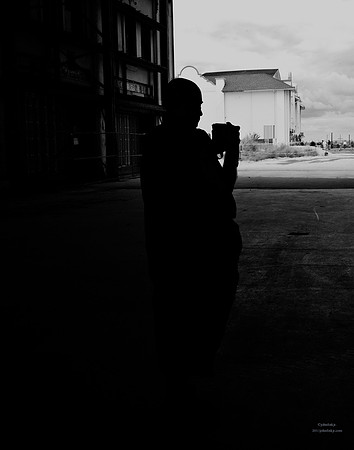 "People, Street Scenes, Pondered Artifacts"