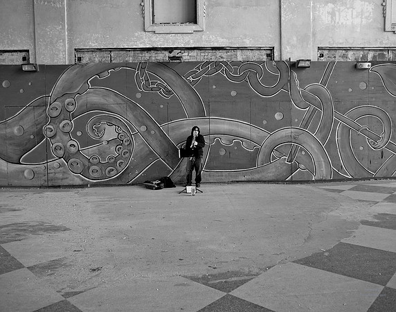 "People, Street Scenes, Pondered Artifacts"