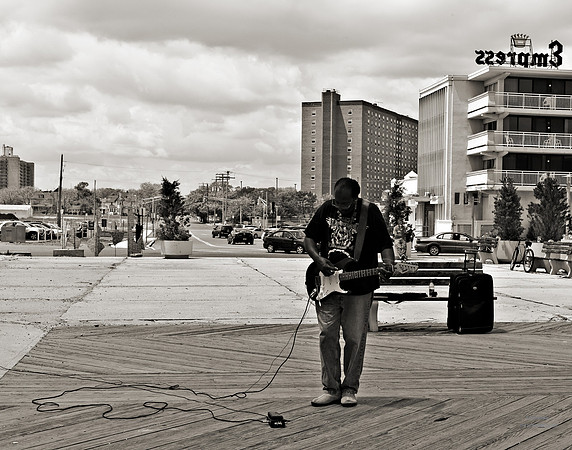 "People, Street Scenes, Pondered Artifacts"