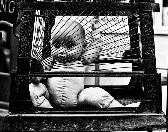 "People, Street Scenes, Pondered Artifacts"