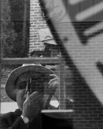 "People, Street Scenes, Pondered Artifacts"